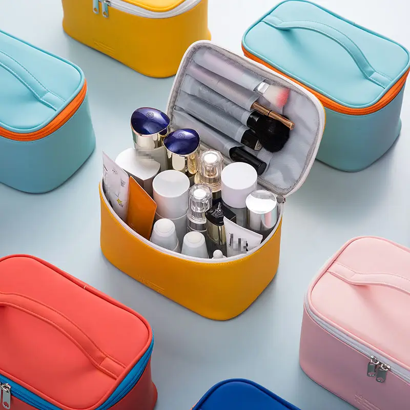 Large PU cosmetic bag wholesale close up showing scratch resistant water repellent leather texture grain